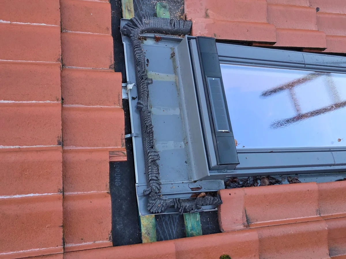 Roof window detail within red roof tiles