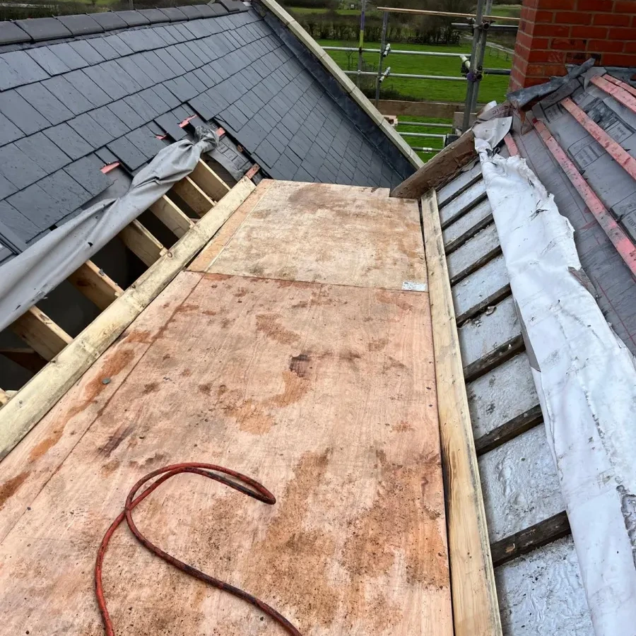 Exposed timber decking during roof renewal