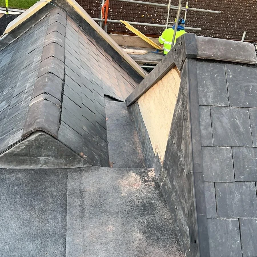 Roof valley and gable junction during roofing work