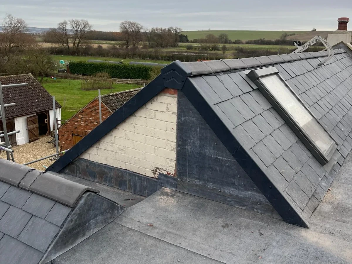 Slate gable, roof window and adjoining valley