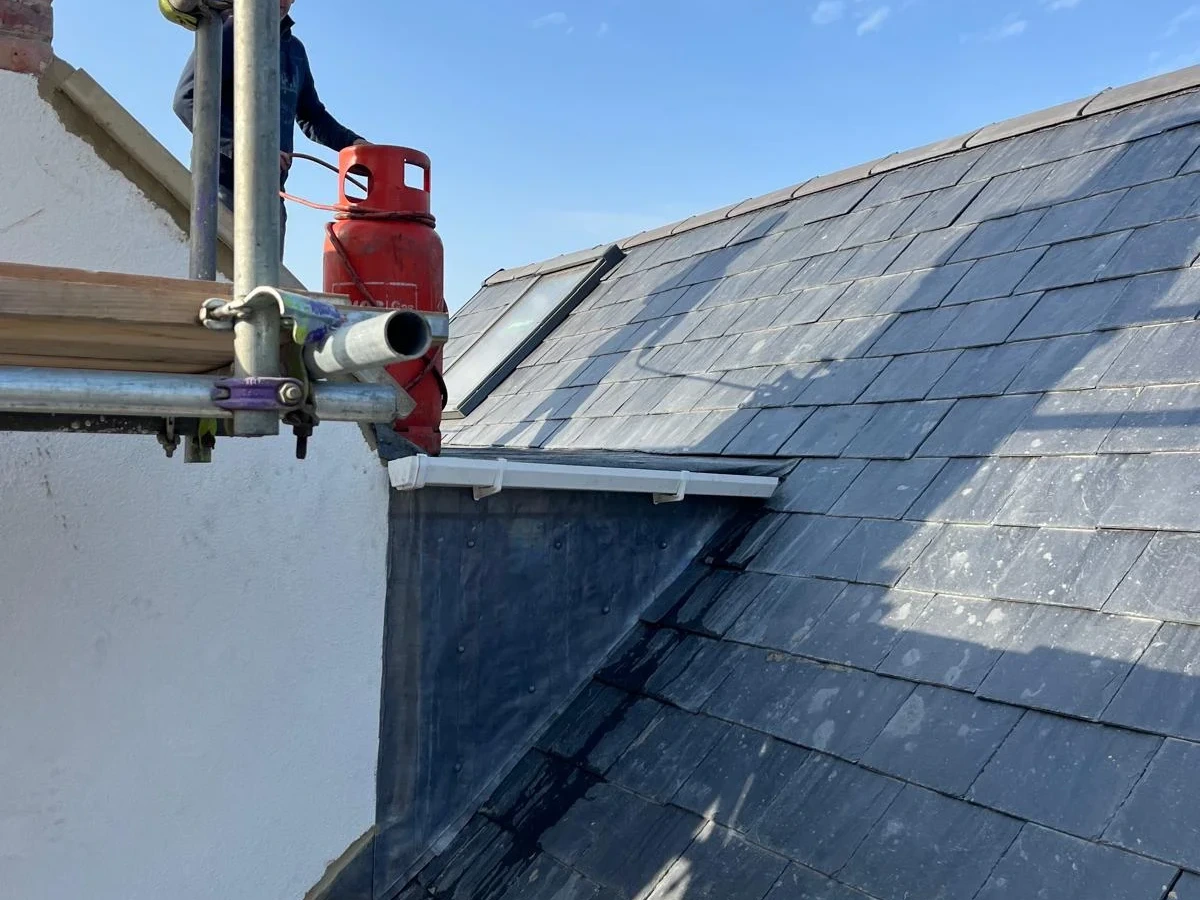 Roof window set into a slate roof slope