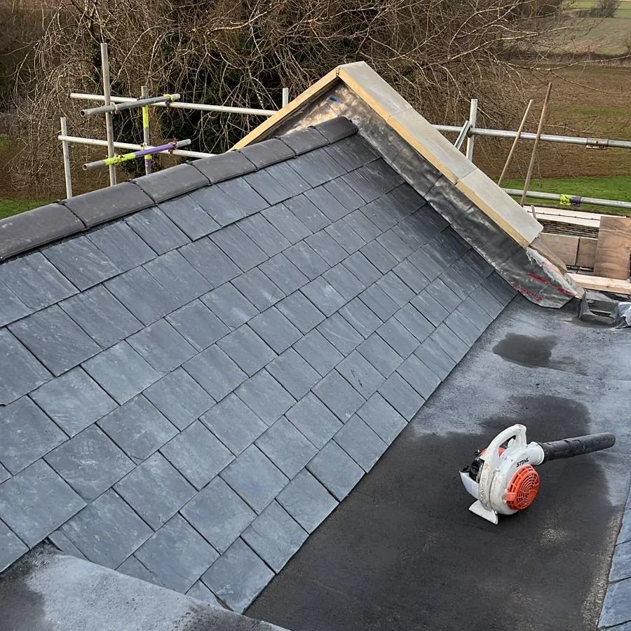 Slate gable roof beside the valley work area