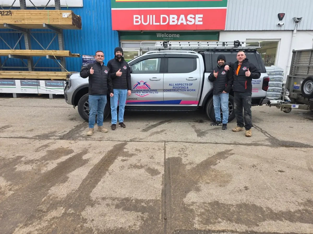 People beside the New Look vehicle at a builders merchant